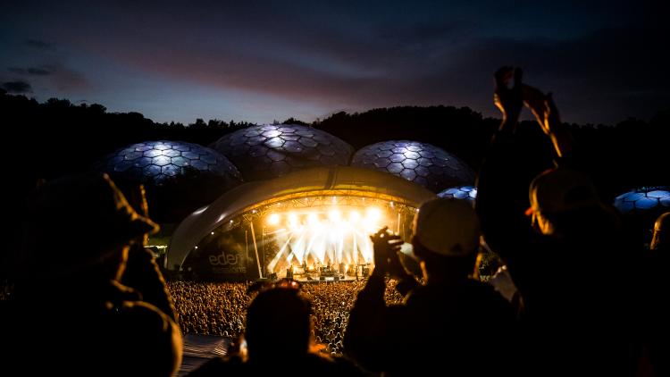 Silhouettes of people on viewing platform watching Eden Session 